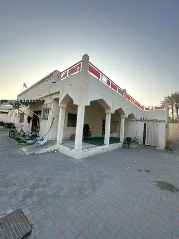 **Corner House for Sale in Al Ghubaiba | 7,500 Sq. Ft. | Rented with AED 70,000 Annual Income**