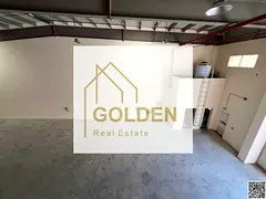 **Prime New Warehouse on the Main Road – Strategic Location and Expansive Loading Area in New Umm