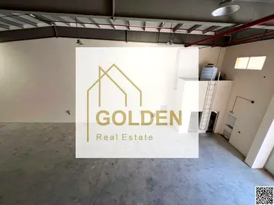 **Prime New Warehouse on the Main Road – Strategic Location and Expansive Loading Area in New Umm A