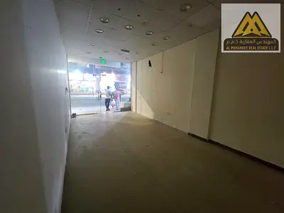 فرصة استثمارية وتجارية فائقة التميز للايجار السنوي محل تجاري بمساحة ضخمة بموقع حيوي واستراتيجي للغاية في منطقة المويهات 3 عجمان على الطريق مباشرة وسط