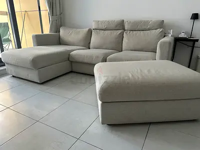 For sale modern L-shape sofa with ottoman in good condition