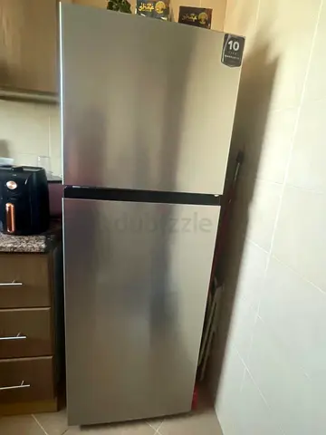 Silver two-door refrigerator - good condition