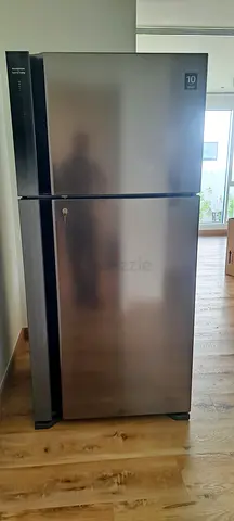 Used stainless steel double-door refrigerator - good condition