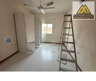 One-bedroom apartment in Al Rawda 3, Ajman, master bedroom, two bathrooms, closed kitchen, split A/C, parking available, close to all services, AED 25