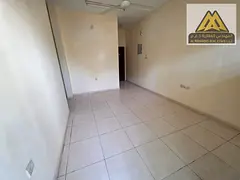 1 Bedroom Hall in Al Nuaimiya 2, ground floor with balcony, 2 bathrooms, prime location near all ser