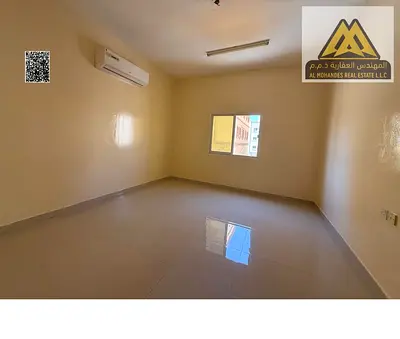 Studio for rent in Al Rawda 3, Ajman. Large space, separate kitchen, split AC. AED 22,000 yearly, 4 payments. Located on Sheikh Mohammed Bin Zayed Roa