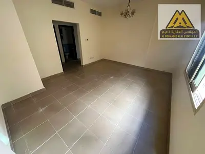 Spacious 3-bedroom apartment with a living room for annual rent in Al Nuaimiya 2, Ajman, with large areas near Al Hikma School