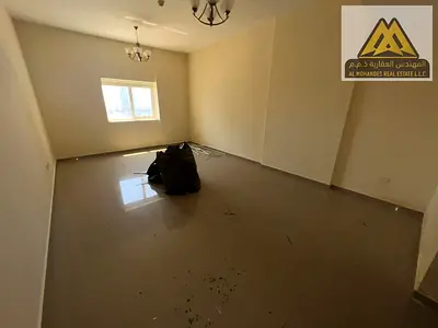 Annual Rental Apartment in Al Rashidiya 3 Ajman Spacious 1 Bedroom Hall Separate Living Room Central AC Built-in Wardrobes Near Grand Mall