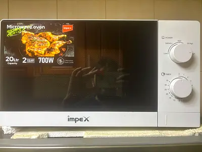 Used Microwave Oven (Good Working Condition) Warranty Valid Until September 2026