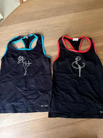 Pair of kids (good for adults also) black athletic racerback tank tops (size XS/ S) - slightly used
