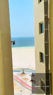2BR hall, first row on Ajman Corniche, spacious layout, large kitchen, 2 baths, prime location near