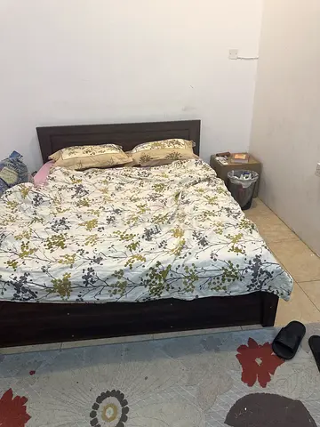 Dark wood double bed frame with headboard - Good condition