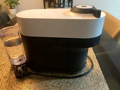 Coffee machine with water reservoir - flawless working condition