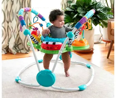 Baby activity jumper/exersaucer with toys - brand new condition