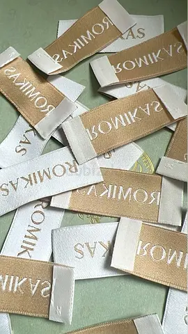 Lot of woven clothing brand labels/tags - white beige (unused)