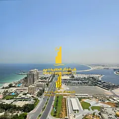 Furnished one-bedroom apartment with sea view, brand new furniture, for monthly rent in Ajman - Corn
