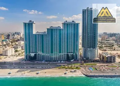 Corniche Ajman, Al Rumaila 2, located in Corniche Tower with a full sea view and first-line position directly facing the beach, offering spacious lay