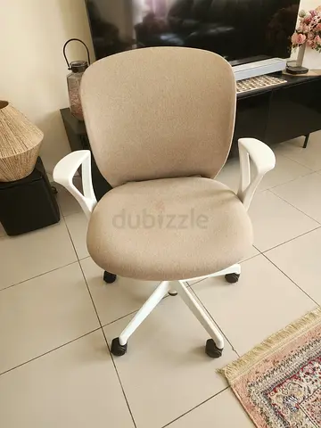 Comfortable Beige Swivel Office Chair on Wheels - Good Condition