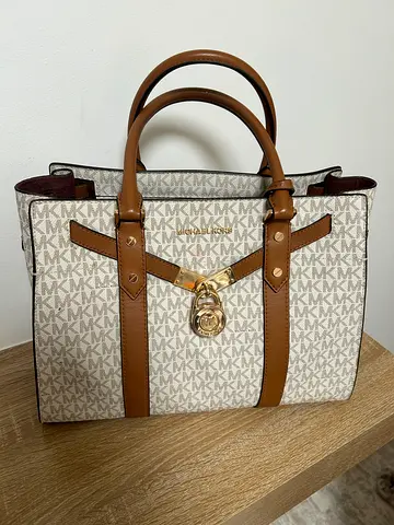 Michael Kors beige monogram tote bag with gold hardware