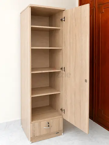 Tall single-door storage cabinet with shelves and lockable drawer - oak finish