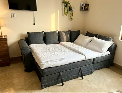 Modern L-Shape Sofa Bed with Storage Upgrade your living room with this stylish L-shape sofa bed. It