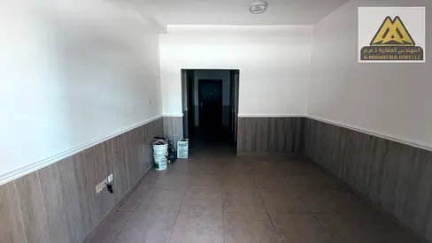 1BR hall in Al Rawda 2, balcony view, laundry room, wardrobes, AED 30k yearly, 4 payments.