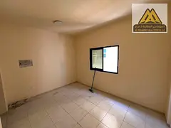 Large Studio Apartment with Semi-Detached Kitchen and Central AC for Rent Al Nuaimia 2 Ajman