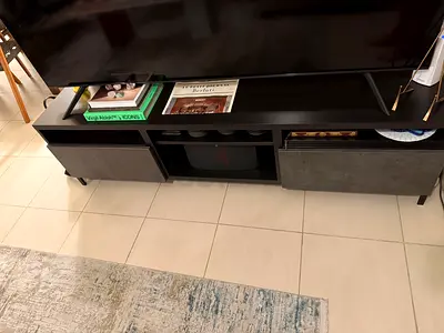 Modern low-profile TV cabinet with storage drawers