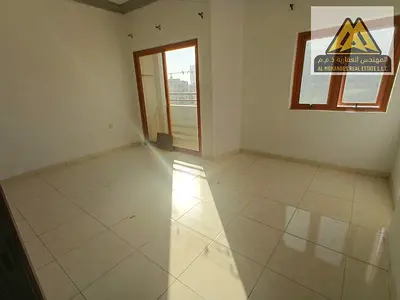 شقة عائلية غرفتين وصالة للإيجار السنوي | الراشدية عجمان تكييف مركزي ومساحة مميزة مع بلكونة  | 2 حمام وتسهيلات سداد حتى 6 دفعات وتأمين شيك بدون تاريخ