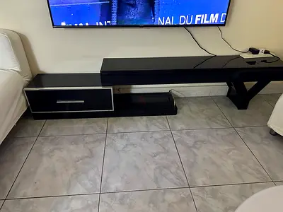 Black modern TV entertainment unit with drawer - good condition