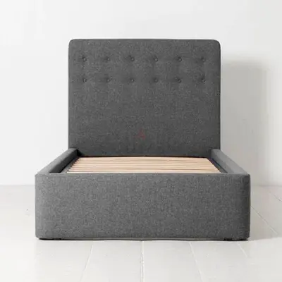 Gray linen thivk twin bed with tall headboard