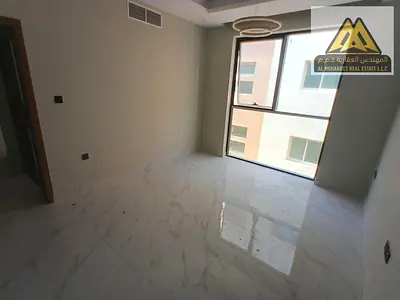 First-occupant apartment in Al Hamidiya 1, Ajman. One bedroom and living room, 2 bathrooms, master room, balcony with view, central AC, maintenance co