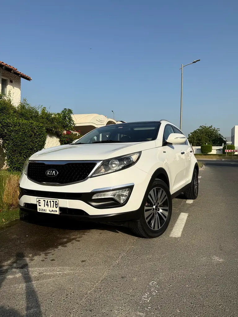 Kia Sportage 2015 — photo 1 of 16