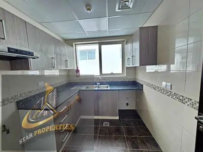 ONE MONTH FREE SPECIOUS NICE ONE BHK CENTRALISED AC AND GAS WITH BALCONY FAMILY BUILDING JUST 32K AL MAHATAH