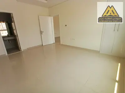 2-bedroom apartment in Al Mowaihat 3 with balcony, panoramic view, and new finishing. AED 50K yearly, 4 payments, near Dubai exit, spacious layout, pr