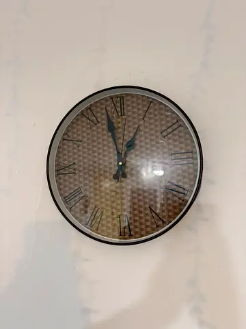 Round Wall Clock with Roman Numerals - Brown Patterned Face