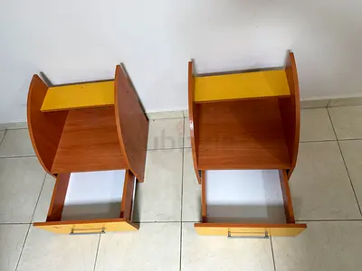 Pair of wooden bedside nightstands with drawers - good condition