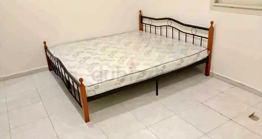 Queen metal and wood bed frame with mattress -