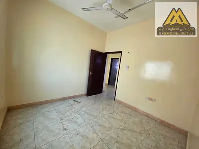 Two bedrooms and a living room, with a balcony offering an open view. Split air conditioning. Two bathrooms.