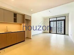 Modern 1BR | Burj + Sea View | Unfurnished