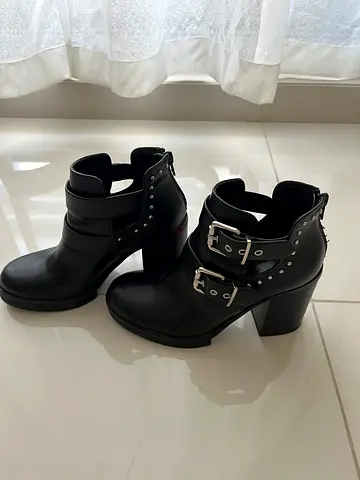 Black leather buckle ankle boots - women’s, size 35