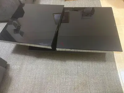 Modern black glass lift-top coffee table, good condition