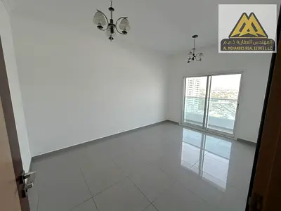 شقة للإيجار غرفة وصالة مع بلكونتين وإطلالة مميزة وتشطيبات فاخرة وموقع حيوي على شارع الشيخ عمار بالجرف 2 عجمان