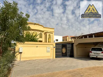 An excellent opportunity to own a luxurious villa in Al Mowaihat 1, Ajman. The villa enjoys a prime location directly facing a park and a mosque