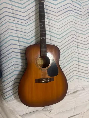 Used full-size acoustic guitar - sunburst finish, good condition, Yamaha.