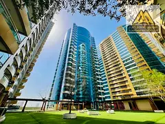 Own a spacious studio in one of Ajman's renowned towers with private parking, a high floor, and 
