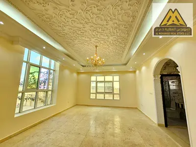 Very Large Layout | 5 Master Bedrooms | 2 Living Rooms | Majlis | Spacious Kitchen | Maid Room | Outdoor Yard | Prime Location in Al Mowaihat
