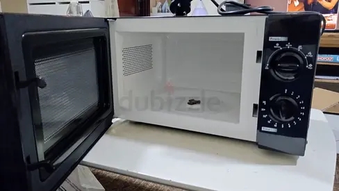 BRAND NEW MICROWAVE 20 LITER