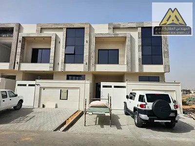 A modern townhouse featuring well-planned spaces, including 5 master bedrooms, a spacious majlis, family living room, main kitchen, and preparatory ki