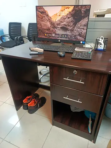 Dark wood office desk with lockable drawers — good condition